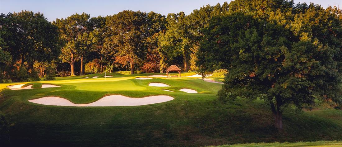 <b>Hole 6   |   Par 3   |   146 yards</b><br /> 
Thompson’s pitch hole has been returned to its original yardage which balances the opportunity to score with the dire consequence of missing your approach. And even if you find the green, the steep contours and large roll in back will still conspire to produce a disappointing three putt.