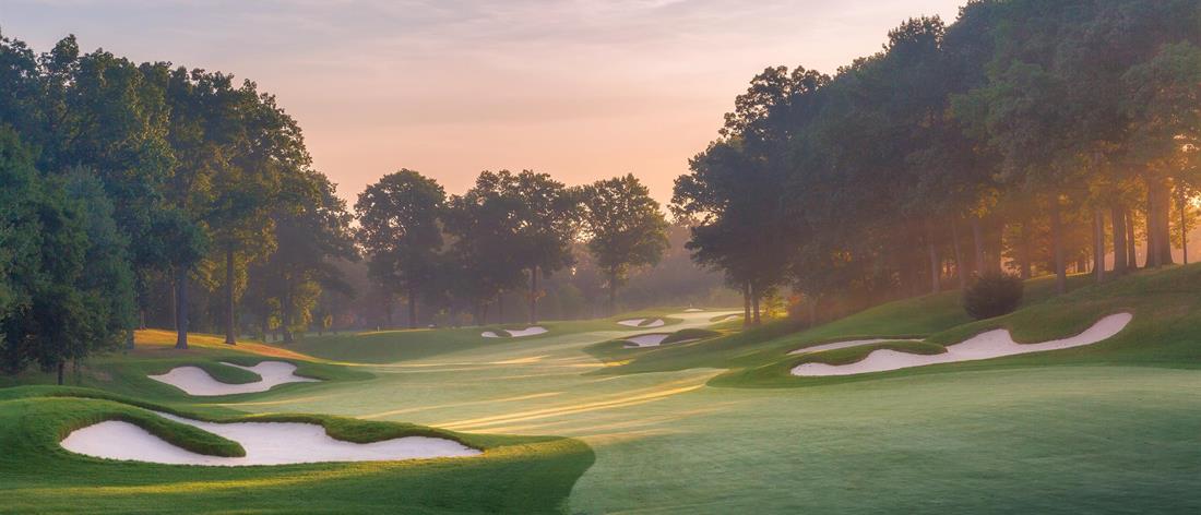 <b>Hole 9   |   Par 5   |   538 yards</b><br /> 
This is one of the wider fairways, where you only need to avoid the bunkers and allow the ball to slide to the left of the fairway. The green was relocated back to the present location by Robbie Robinson and features a strong central swale dividing higher front and back pins.