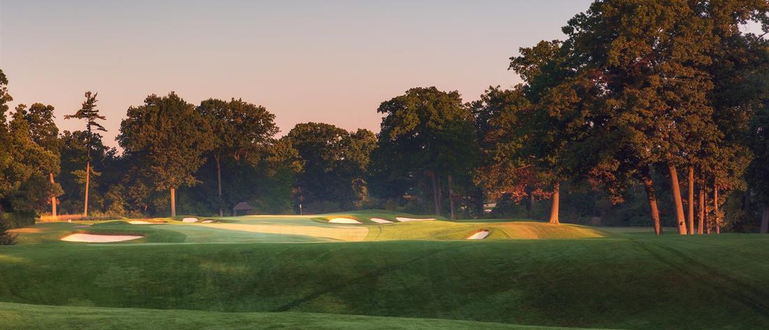 <b>Hole 10   |   Par 4   |   372 yards</b><br /> 
This hole presents an interesting conundrum off the tee, the ideal lay-up is to a tiny plateau, playing to the bottom creates a blind approach and a driver into the upslope brings the bunkers into play. But choose wisely since the approach is to a shallow angled green made to receive a short iron.